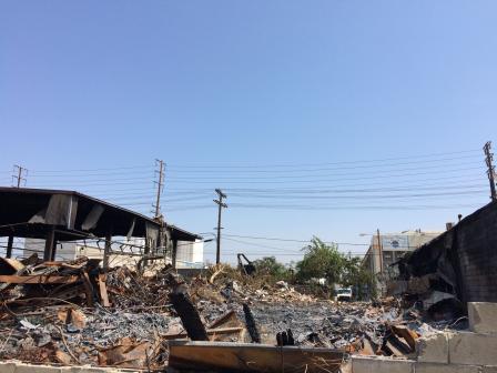 Fire gutted building and debris.