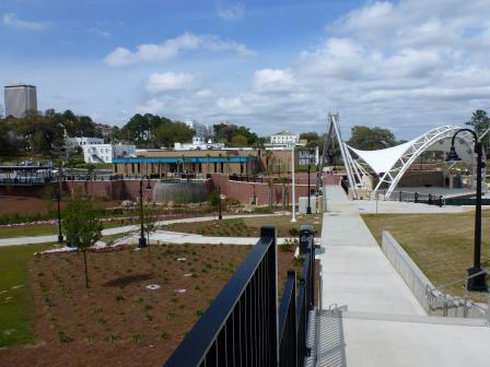 Central view of Cascades Park, with Meridian Plaza and fountains on the left and the amphitheater on the right