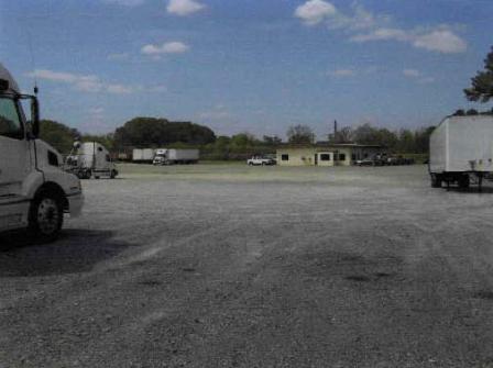 The Site is currently being leased to H&W Transfer Company for truck parking and maintenance