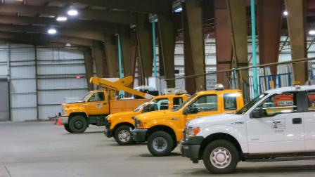 Work vehicles inside the ODOT building on site
