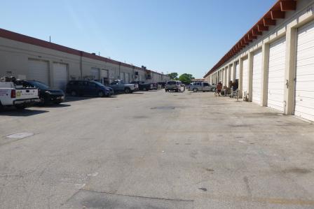 View of warehouses and storage units occupied by various light industrial businesses at the Petroleum Products Corp. site