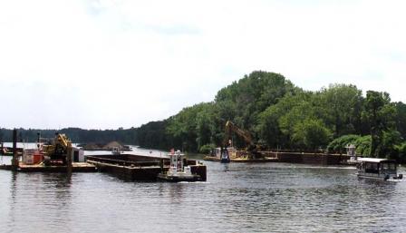 Tugboats were used to move barges of contaminated sediment to an upstream processing facility and clean backfill to the previously dredged areas.