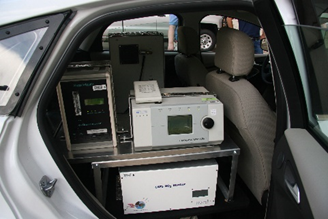 Back Seat Monitoring: The mobile measurement vehicle is retrofitted with sophisticated air monitoring instruments, including from left: an aethalometer, which measures black carbon, aerodynamic particle sizer, which measures pollution size, and from botto