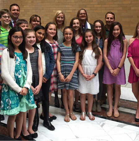 This is a picture of a group of students involved in the Katharine Bates Elementary School food rescue program.