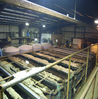 Inside Cedar Valley Electroplating facility showing deteriorated and hazardous conditions