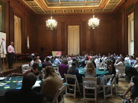 People listening to speaker at 2017 Local Foods, Local Places Summit