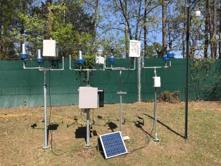 SPods (in blue) are fenceline monitoring devices developed by EPA to measure air pollutant plumes at an industrial facility.  EPA scientists tested them at EPA’s research campus in RTP, NC, alongside prototypes designed by commercial developers using the 