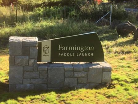 Sign marking the Farming Paddle Launch on the Tualatin River Water Trail in Oregon.