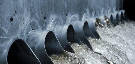 Water pouring out of large drains