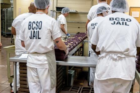 This is a picture of kitchen workers in the Boulder County jail.