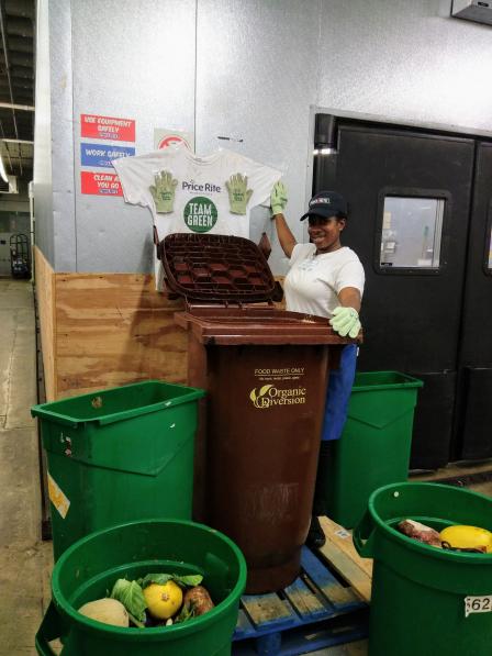 This is a picture of a worker composting at a Ravitz supermarket.