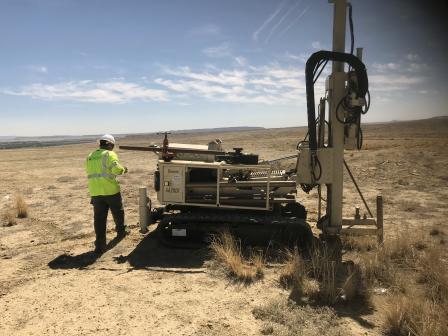 Cyprus Amax using a drill rig to take subsurface soil samples at the Climax Transfer Station in the Shiprock Chapter.