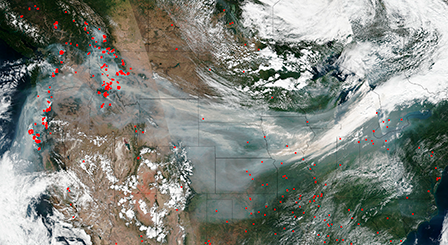 Satellite image of wildfire smoke crossing the US on the jet stream.