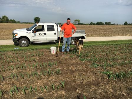 steve ehrler and his dog tend to the farm