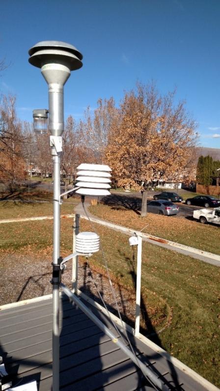 Air sensors operating in close proximity to regulatory-grade or other conventional air quality monitors in Iowa