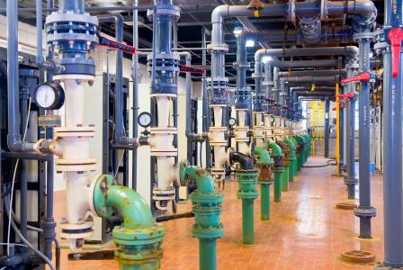 Inside a water treatment plant. View of pipes and instruments