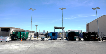 airport exterior with compactors visible