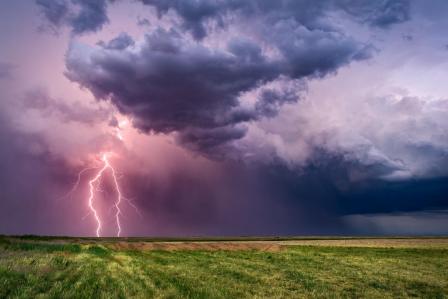 Lightning bolt striking a field.