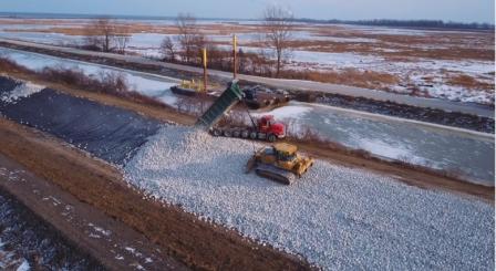 photo of Phase 1 wetland restoration construction is progressing as rock is placed in Howard Marsh (Maumee AOC) to create 1,000 acres of diverse marsh habitat on the shores of Lake Erie. Photo credit: Toledo Metroparks
