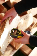 Testing firewood with a moisture meter