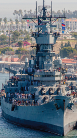 USS Iowa from the front showing crowds of people