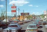 Decorative image of a highway with traffic.