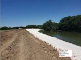 Garland Raod Landfill nd Stillater River concrete revetment installed on riverbank to prevent erosion.